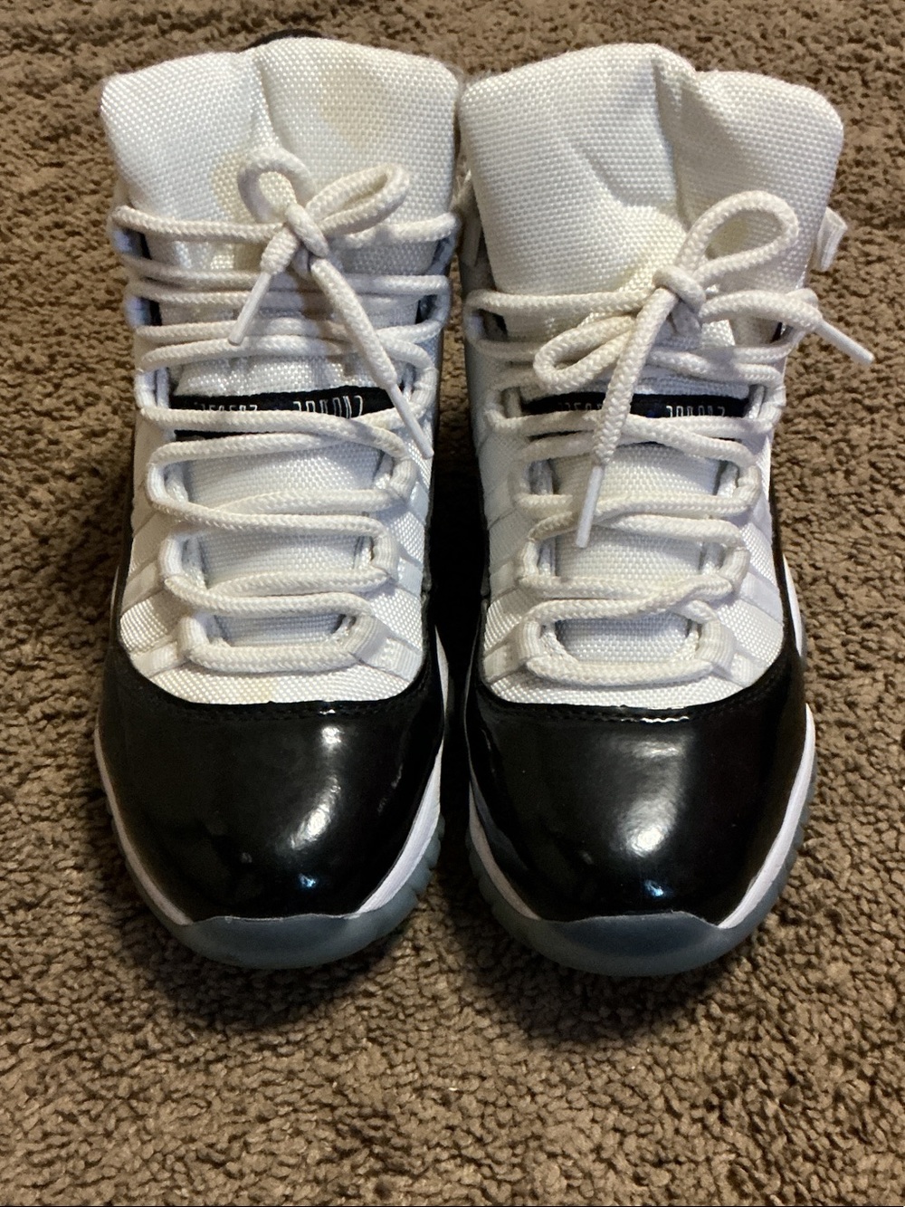 White and Black High-Top Jordan 12s Shoes